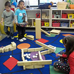 children building blocks together