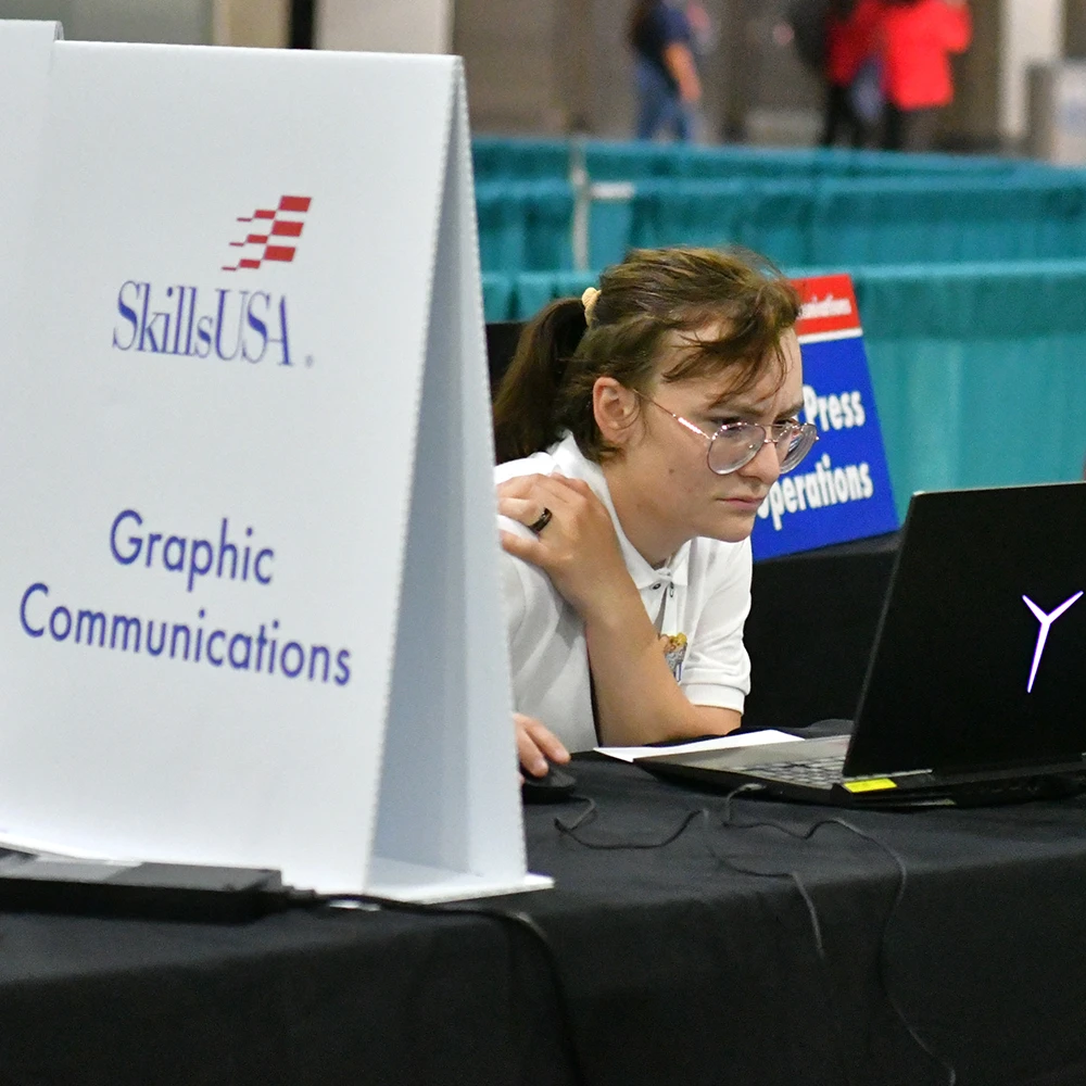 Woman works on laptop