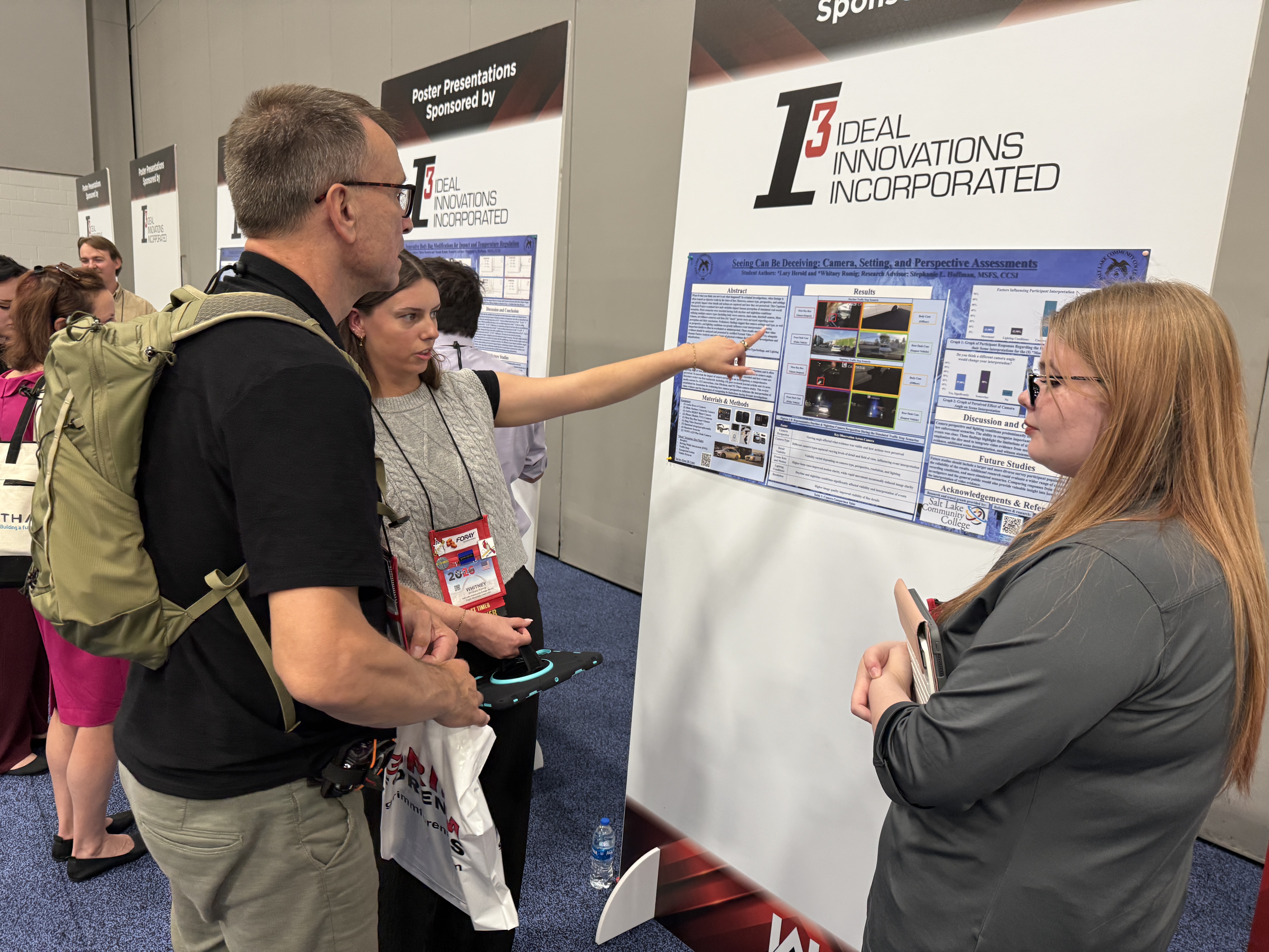 An SLCC forensic science student presents capstone research to conference attendees during the International Association for Identification Conference.