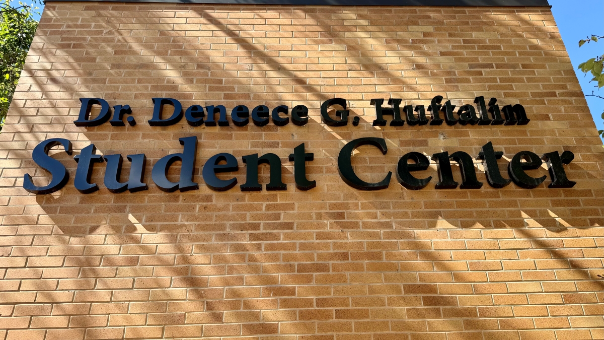 Deneece G. Huftalin Student Center. Picture of a plaque outside of the Deneece G. Huftalin Student Center that memorializes the center being renamed in her honor