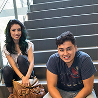 Students sit on staircase