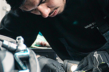 a man working on a car